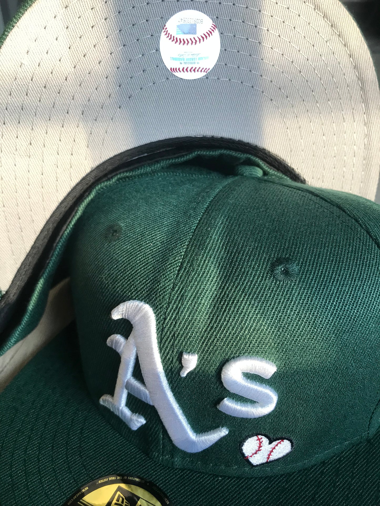 Oakland Athletic’s Team Love Fitted Cap