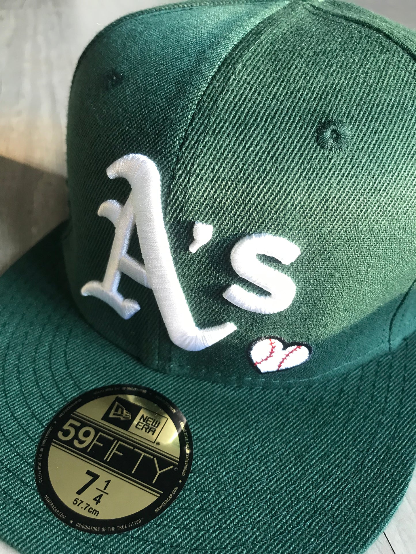 Oakland Athletic’s Team Love Fitted Cap